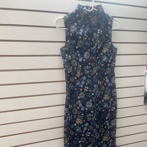 Thisis an Asian inspired dress never been worn size small